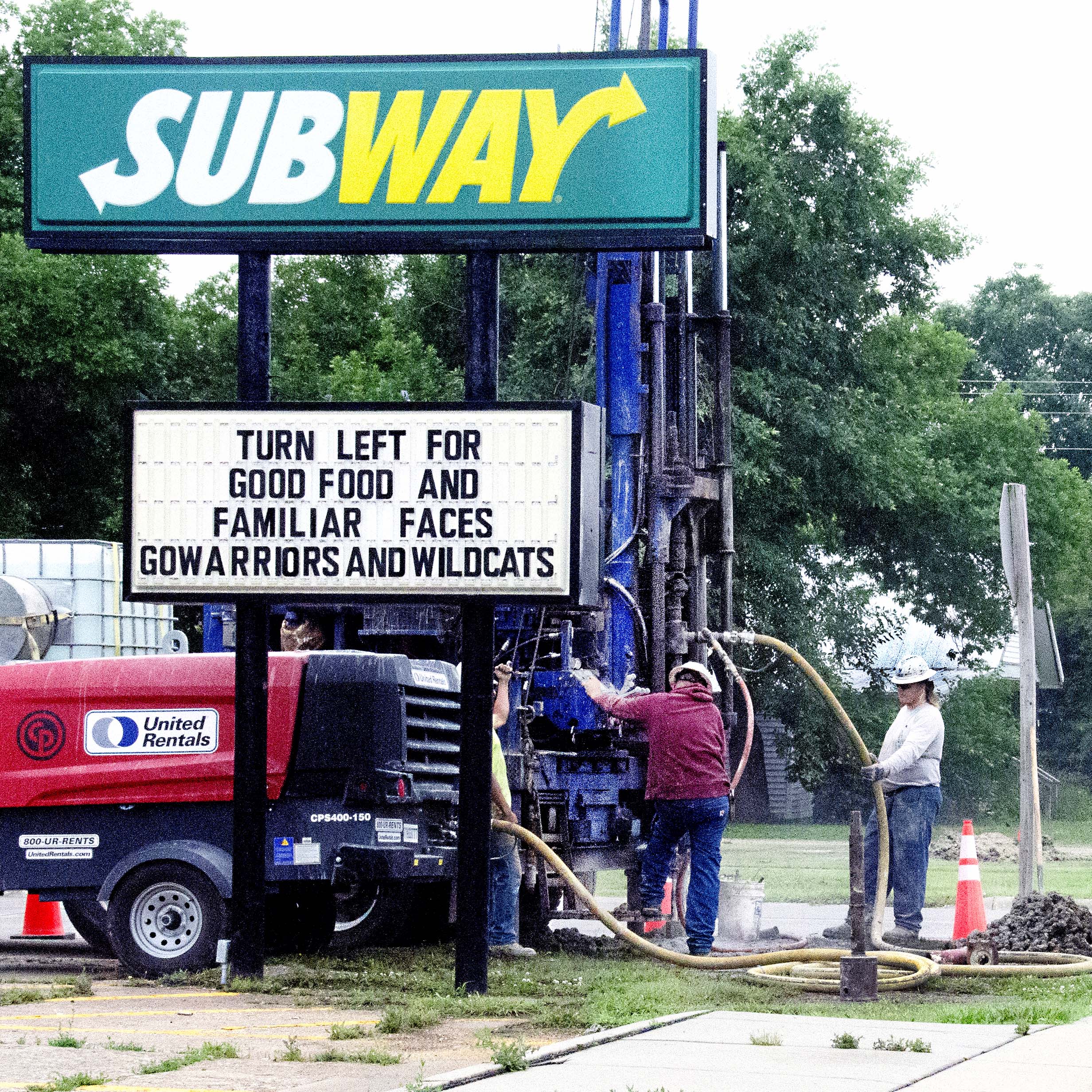 GSI Engineering employees drill a groundwater well Thursday at the corner of Freeborn and Main Sts.
